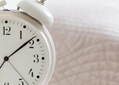 Alarm clock symbolizing the importance of morning and evening rituals for busy moms.